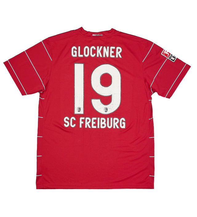CULT KITS - 2009/10 FREIBURG GLOCKNER #19 *SQUAD SIGNED* HOME SHIRT (L) NIKE